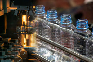 Plastic bottles in a manufacturing line.